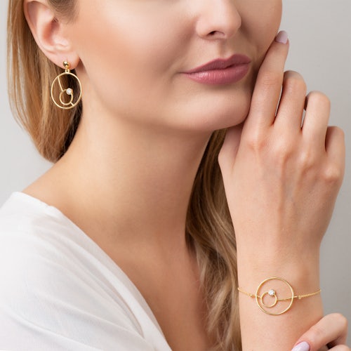 Kolczyki koła Savicki: srebrne pozłacane, cyrkonie